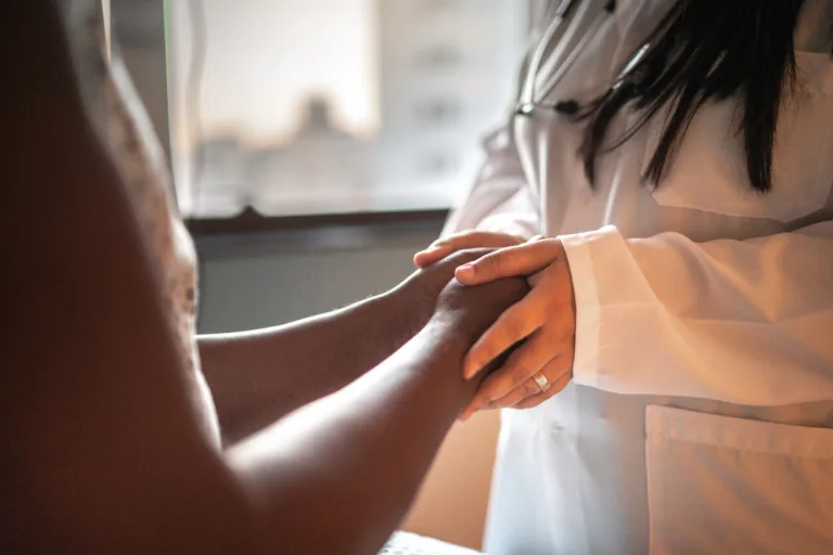 patient speaking to doctor about their condition