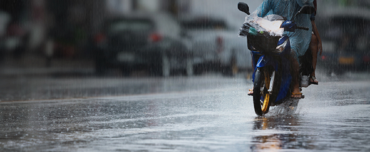 motorcyclist riding during bad weather