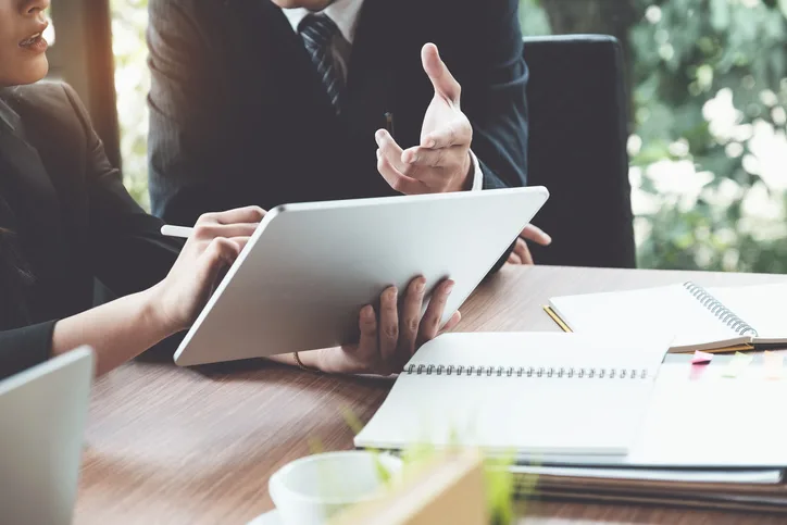 Personal injury attorneys discussing case