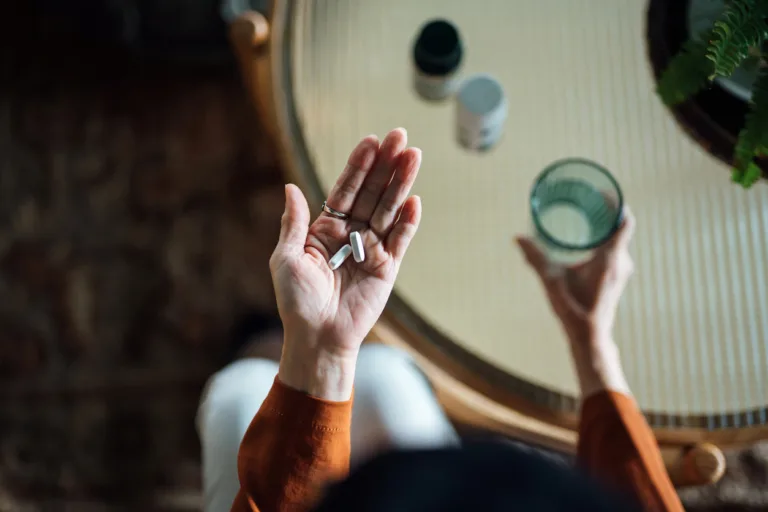 woman taking prescription medication