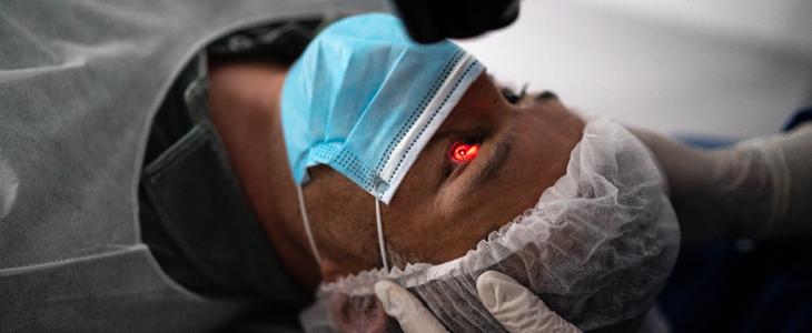 Patient undergoing lasik eye surgery in an operating room