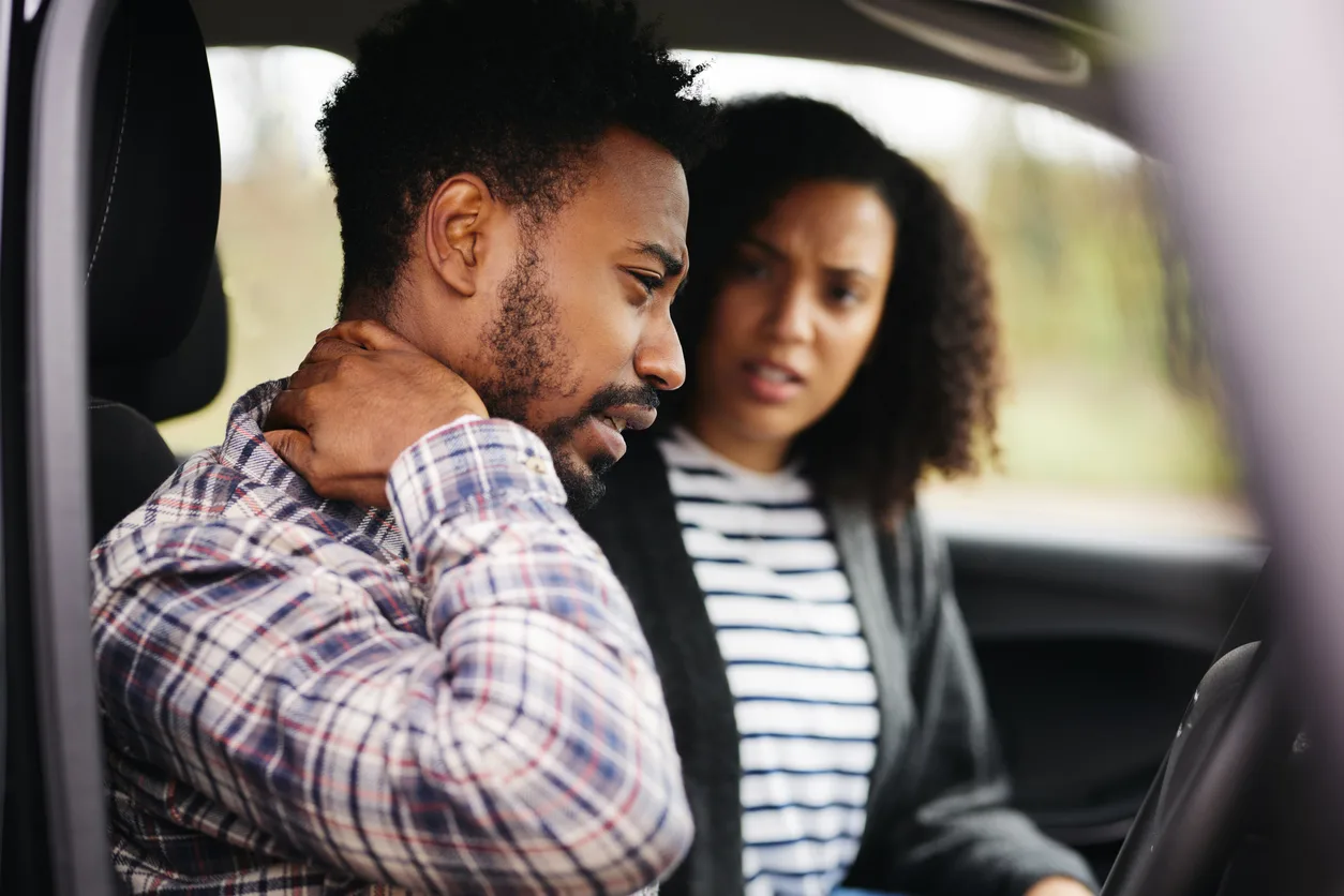 man in vehicle with woman