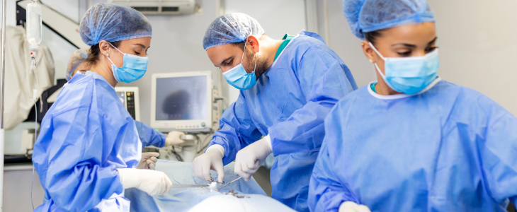 Surgeons performing a gastric bypass on a patient.