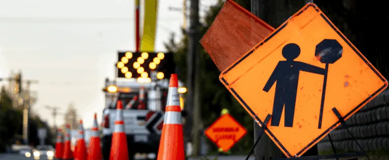 Road hazard signs in the road