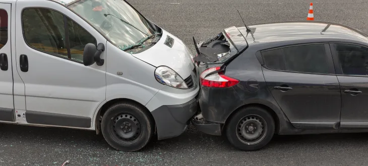 Truck rear-ended a car in the road