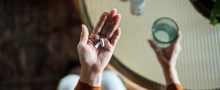 Woman taking her medicine